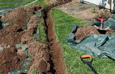 Travaux de tranchée pour enfouissement de câble fibre